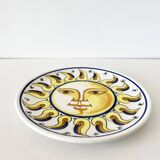 Decorative ceramic plate with sun face