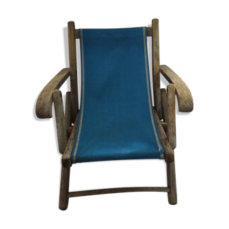 Folding wood and blue fabric lounger chair