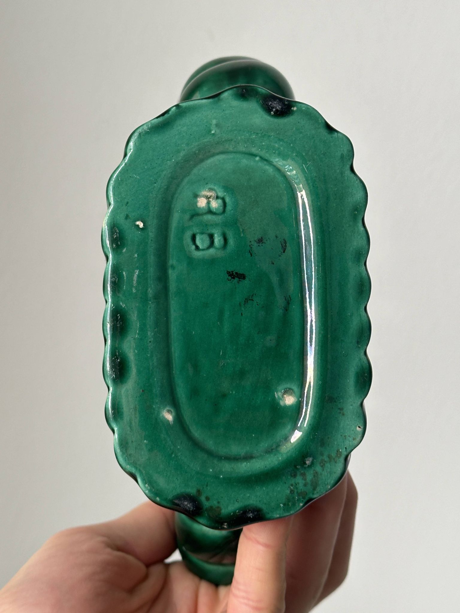 Twisted candle holder with 2 lights from the 40s, in green ceramic