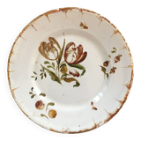 Old plate with floral decoration