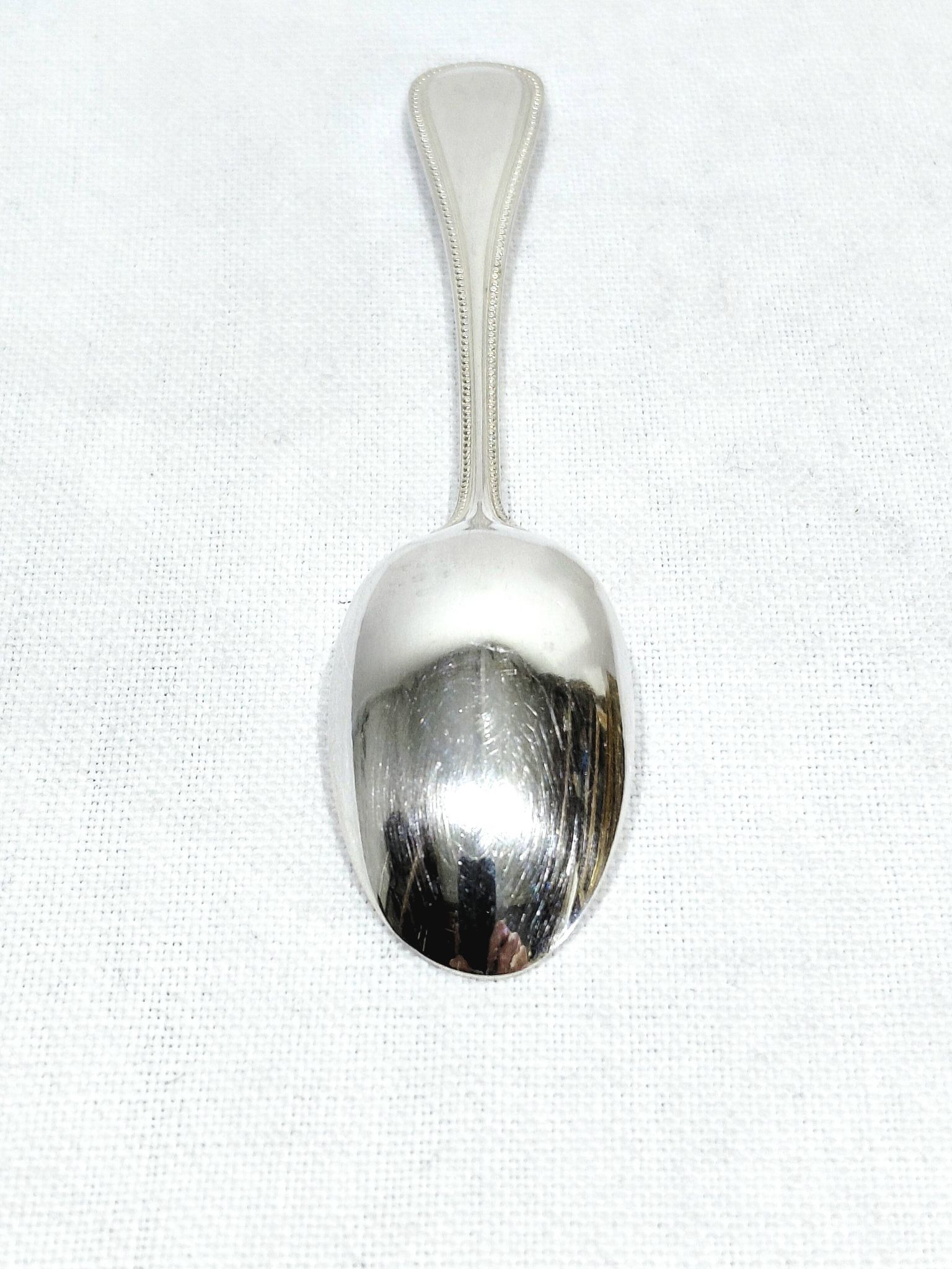 Christofle - 12 cuillères à Moka Perles