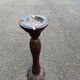 Round candle holder in turned carved wood