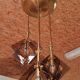 Suspension design in brass and smoked glass