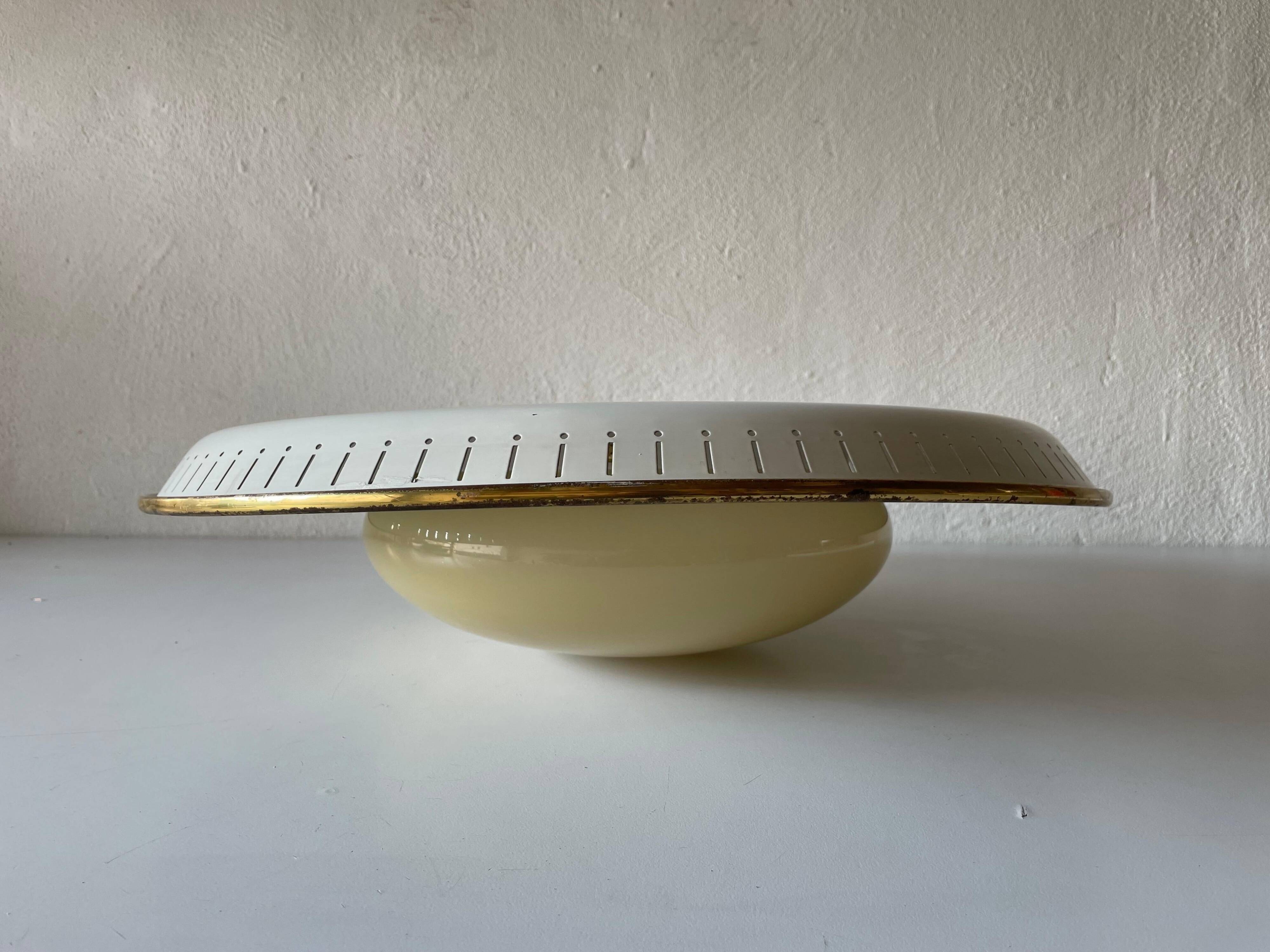 Brass disc and glass clip lamp from the mid-century by Hillebrand, 1950s, Germany.