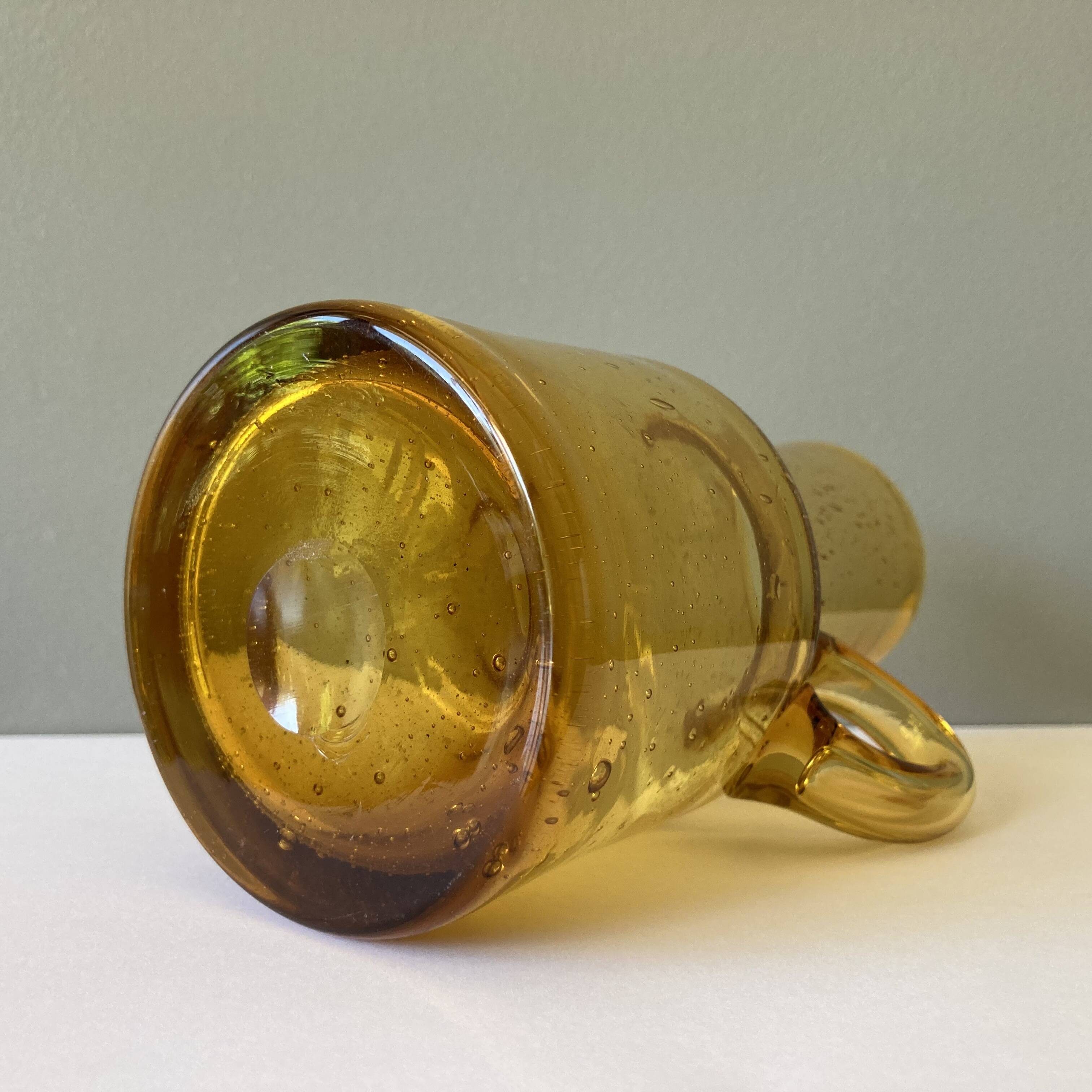 Vintage pitcher or jug forming a vase in amber and bubbled glass in the style of Biot glassware