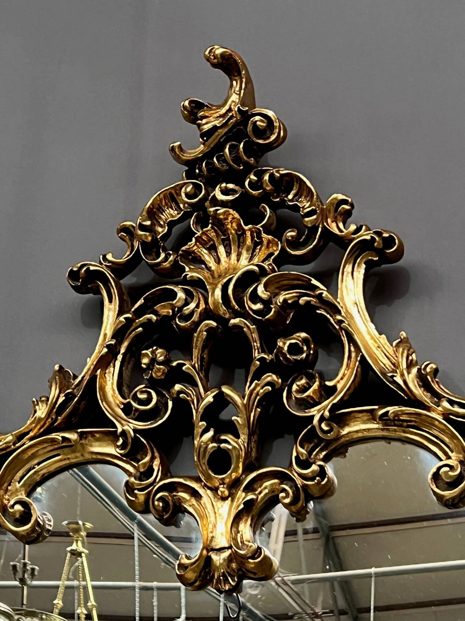 Mirror set with baroque style gilded wood console on marble top.
