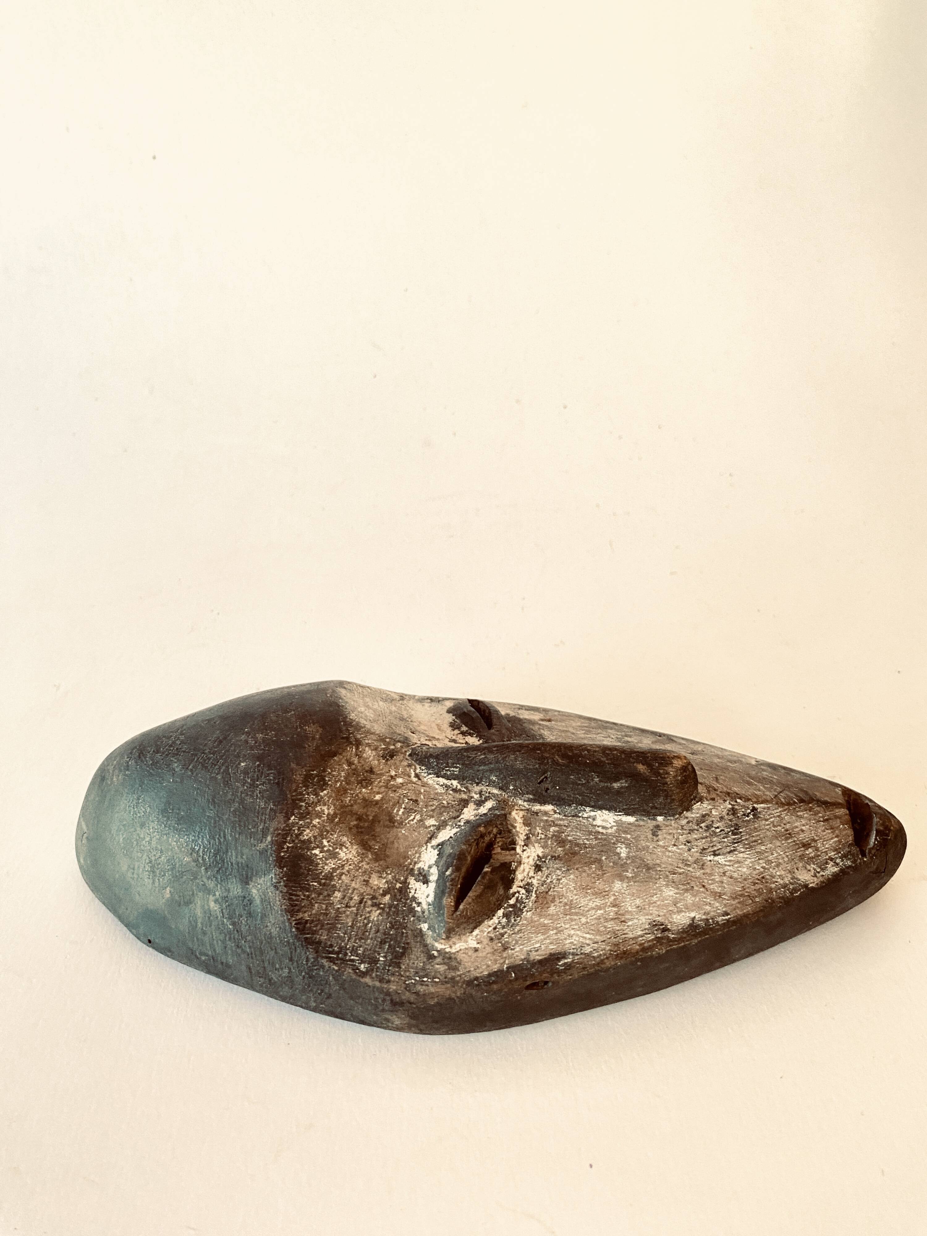 African mask, Fang tribe, wood and kaolin