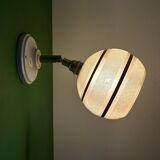 Vintage globe wall light in frosted yellow and gold glass.