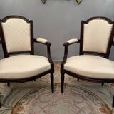 Pair of walnut armchairs from the Louis XVI period around 1770