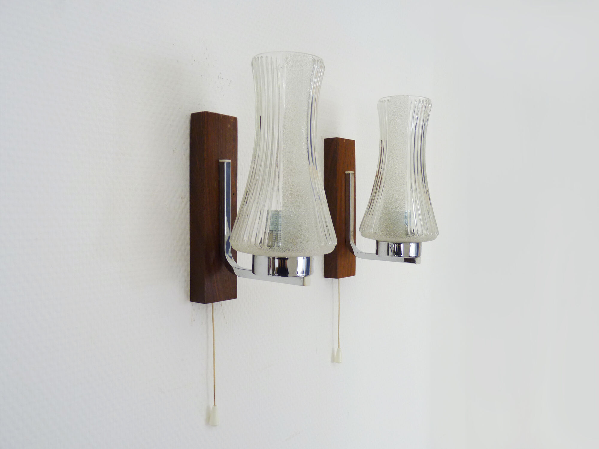 Pair of Scandinavian vintage wall sconces with pull shot, wood and chrome metal. Year 60
