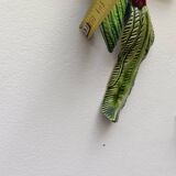 Two exotic birds in slip to hang