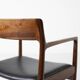 Fauteuil en palissandre et cuir noir, par J. Norgaard, Danemark, années 1960.