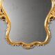 Carved and gilded wooden mirror in Barocchetto style