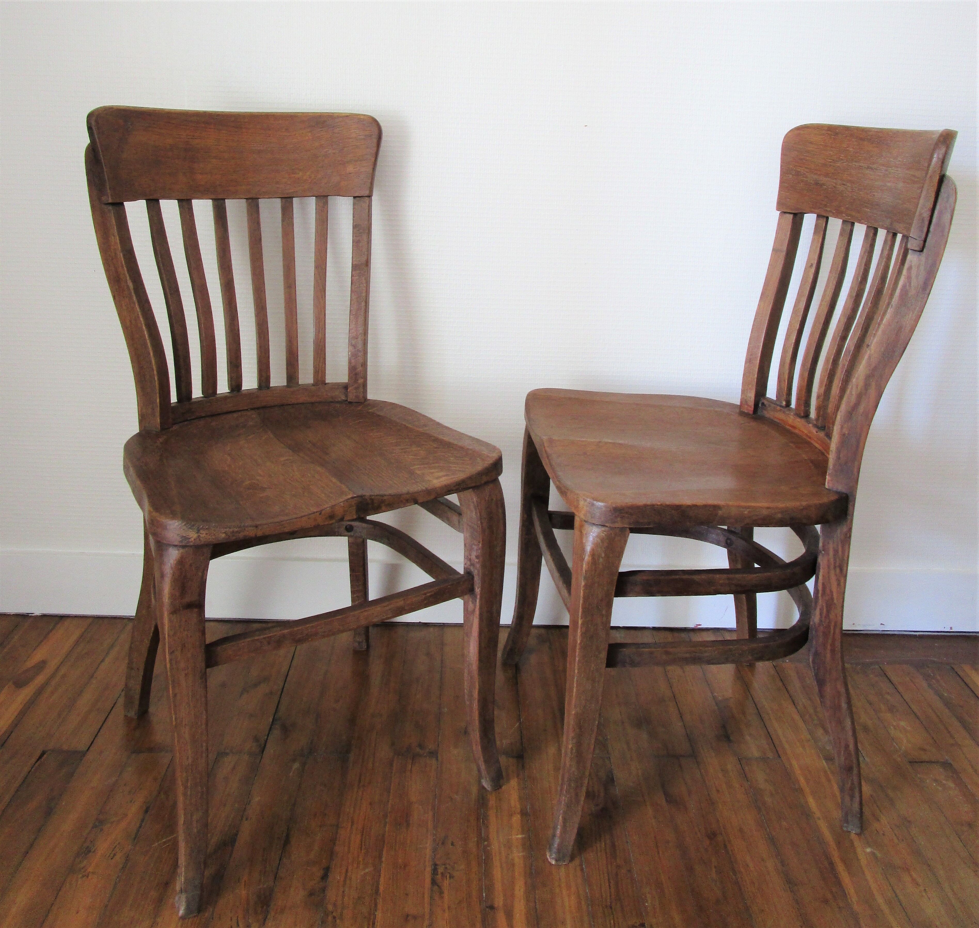 Two chairs solid oak patinated early twentieth century