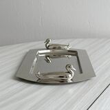 Shiny metal foie gras dish