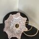 Suspension vintage opaline rose mouchetée et laiton