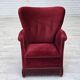 Fauteuil danois des années 1970, velours de mobilier rouge cerise, pieds en bois de chêne.