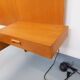 Double bed in vintage Scandinavian style from the 1960s with bedside tables.