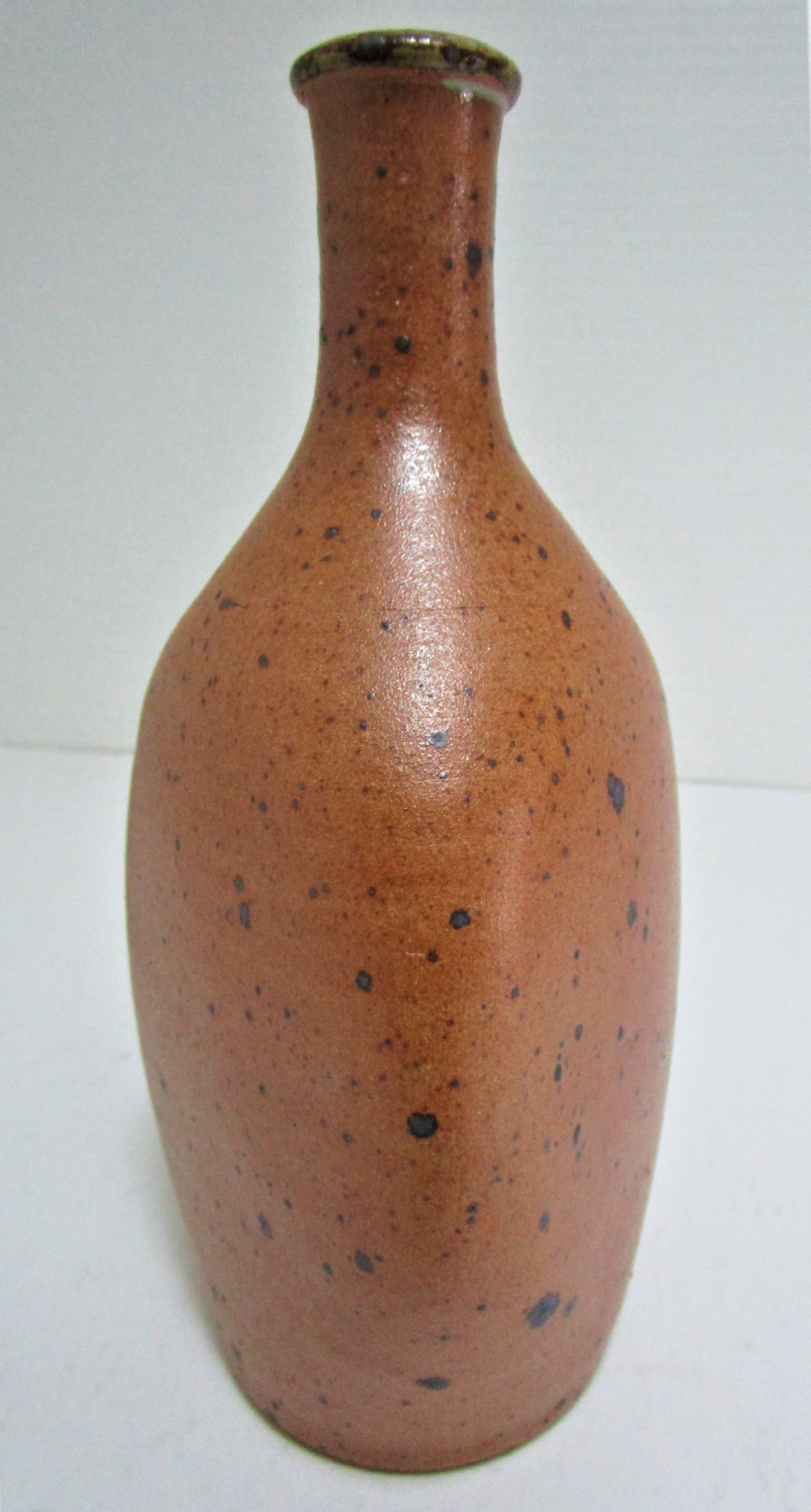 Soliflore vase in pyrite sandstone with three vintage faces