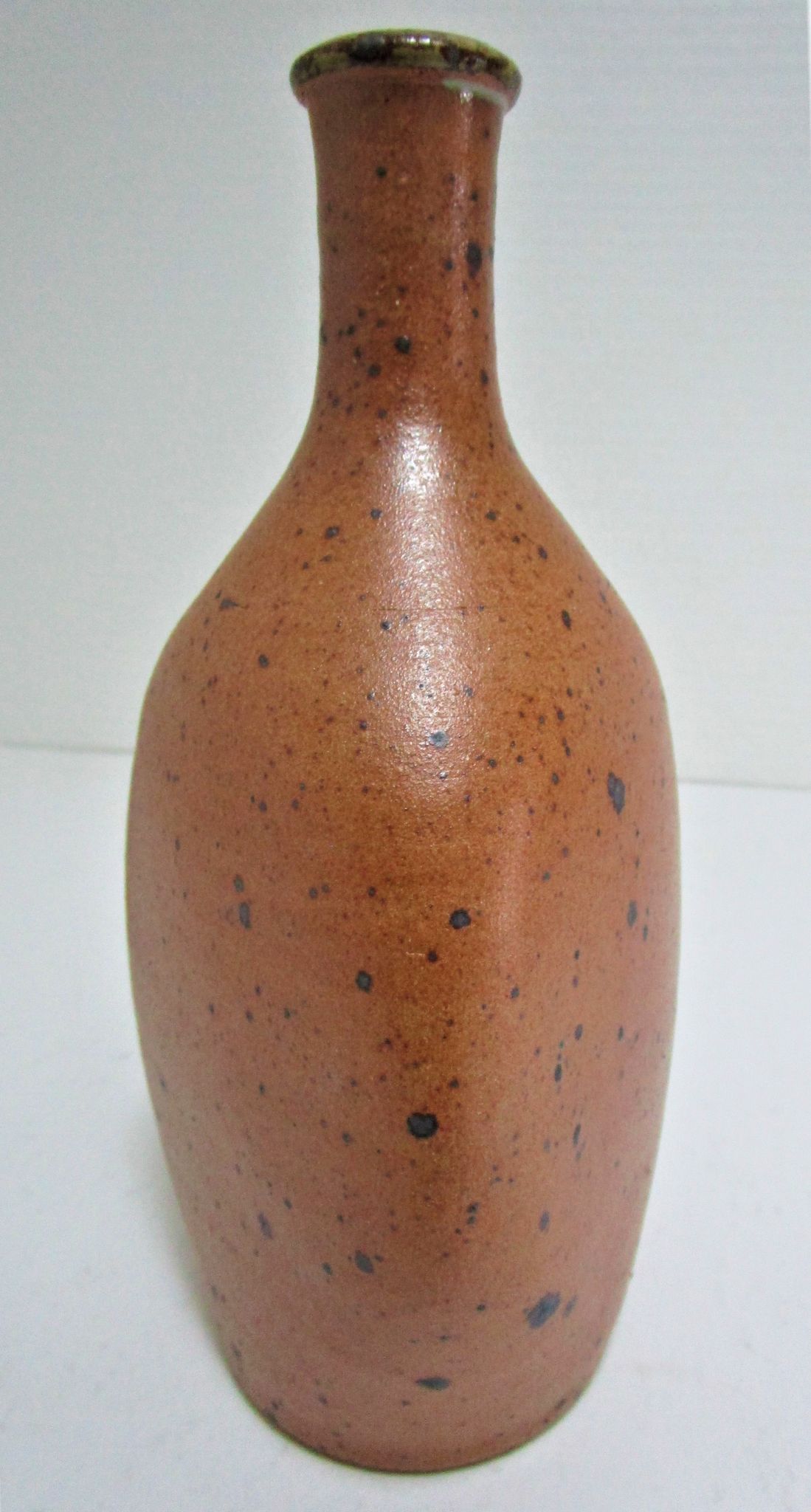 Soliflore vase in pyrite sandstone with three vintage faces