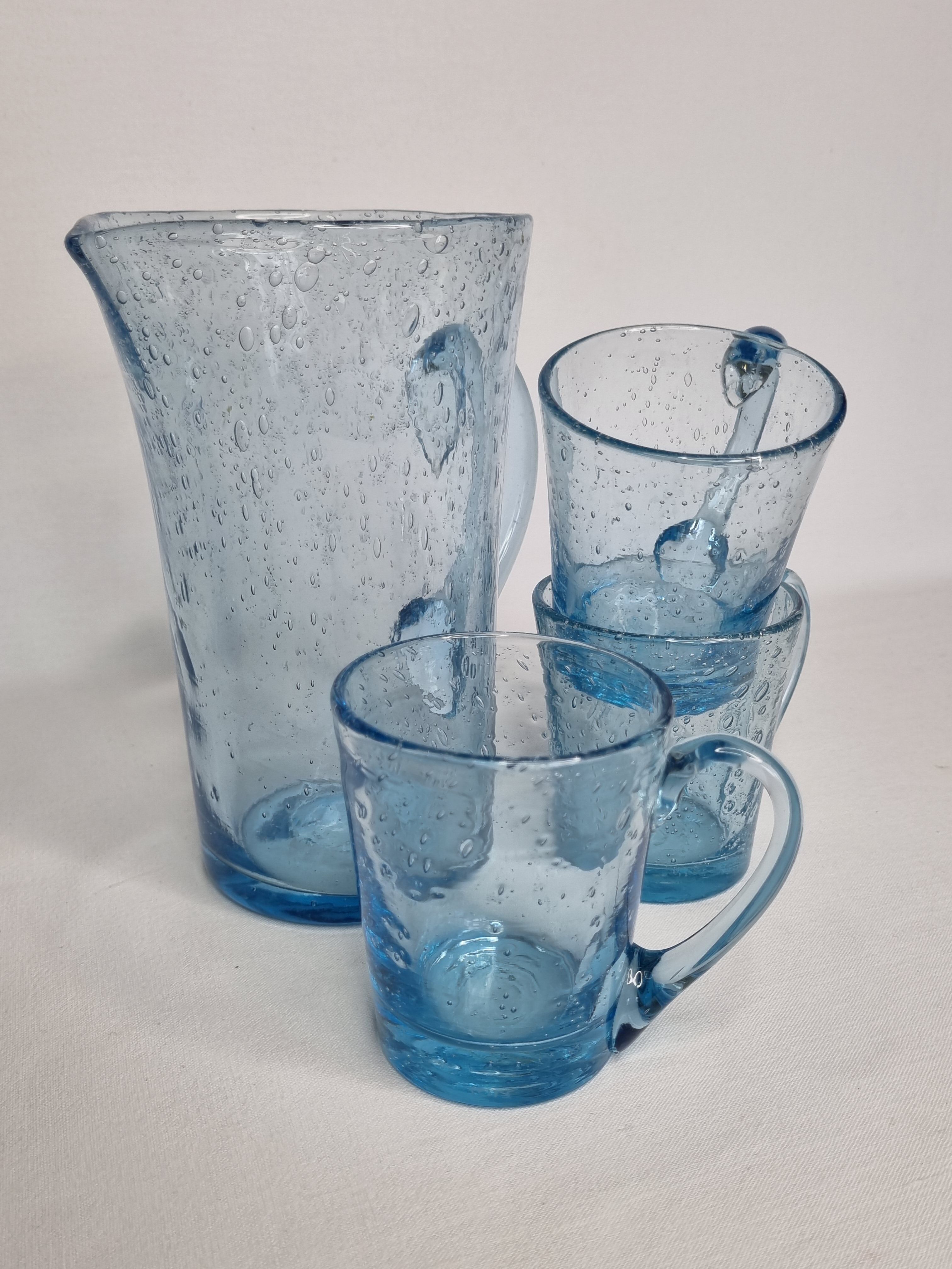 Orangeade service in bulled glass, a carafe and three glasses, Biot glassware
