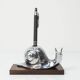 Silver snail candlestick on a teak base 1960