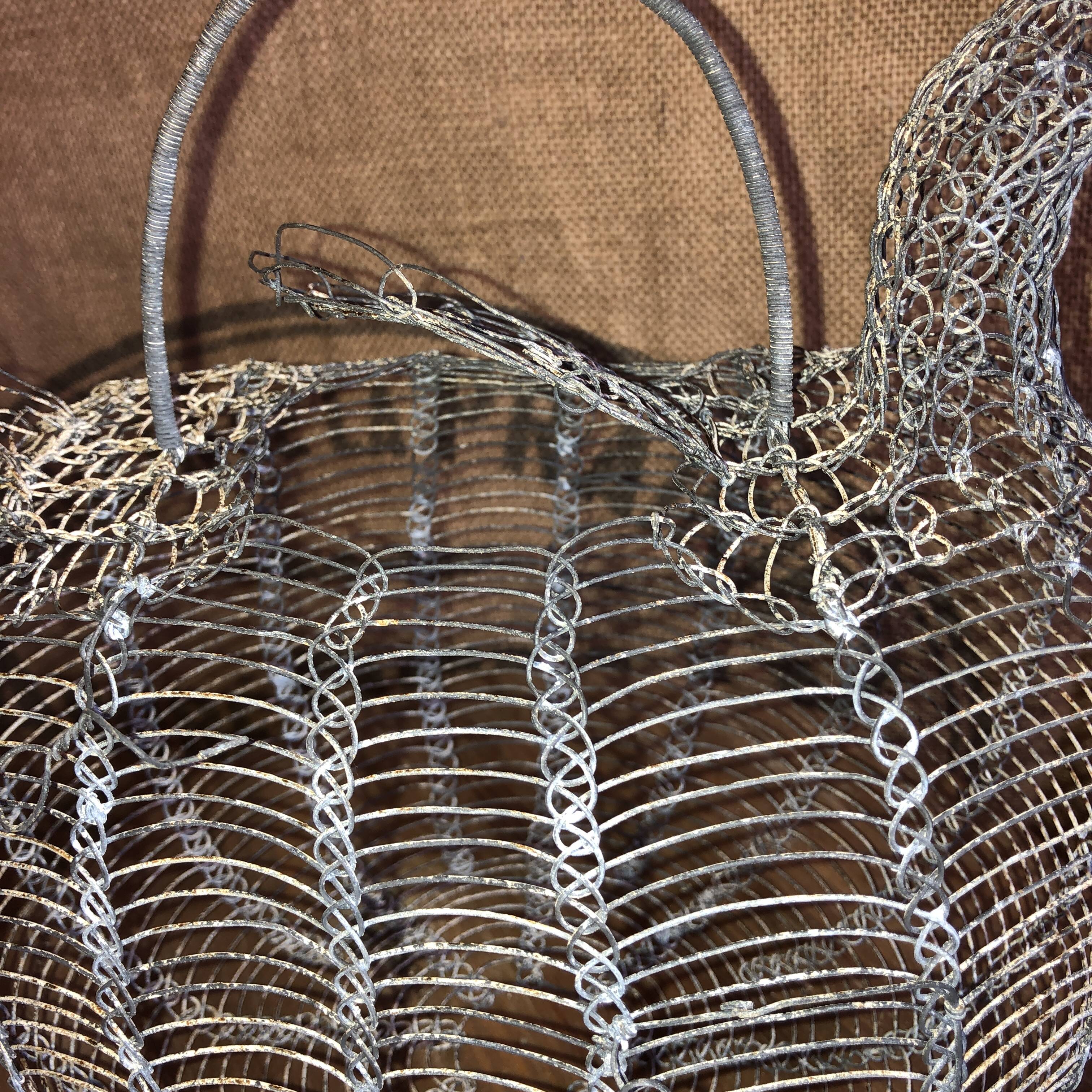 Old wire and mesh egg basket