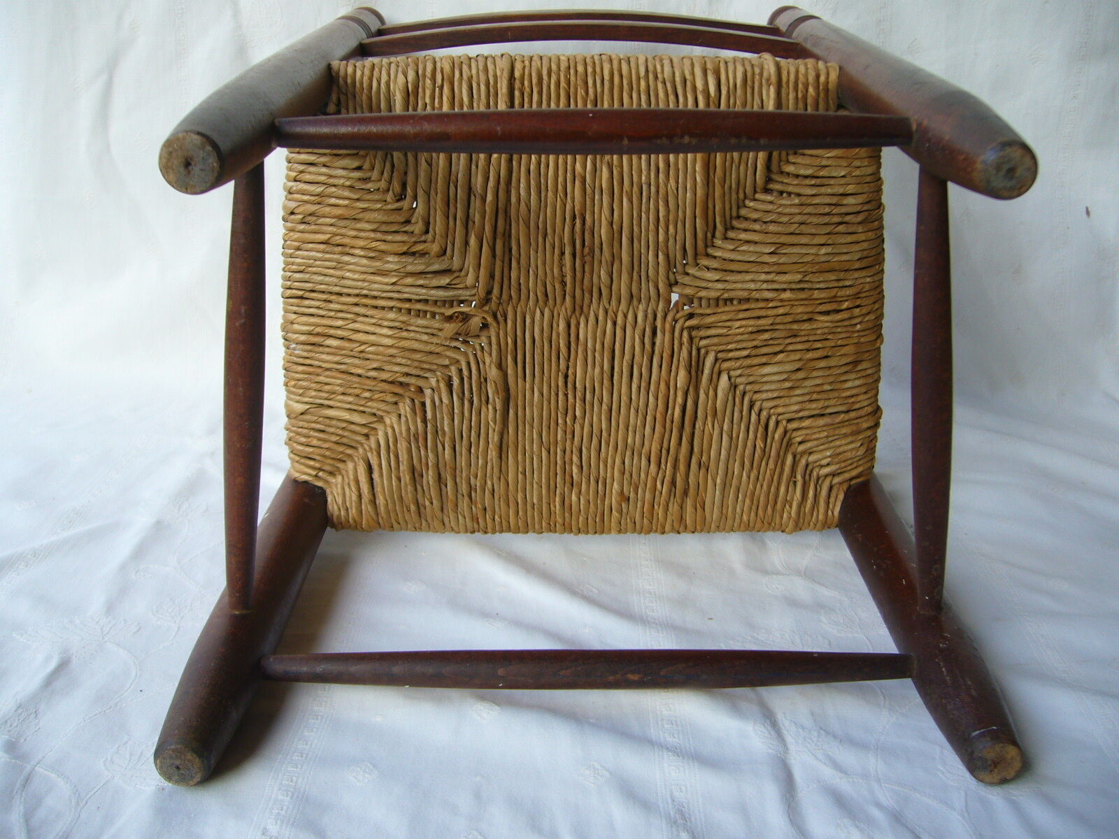 Wooden child's chair and mulched seat