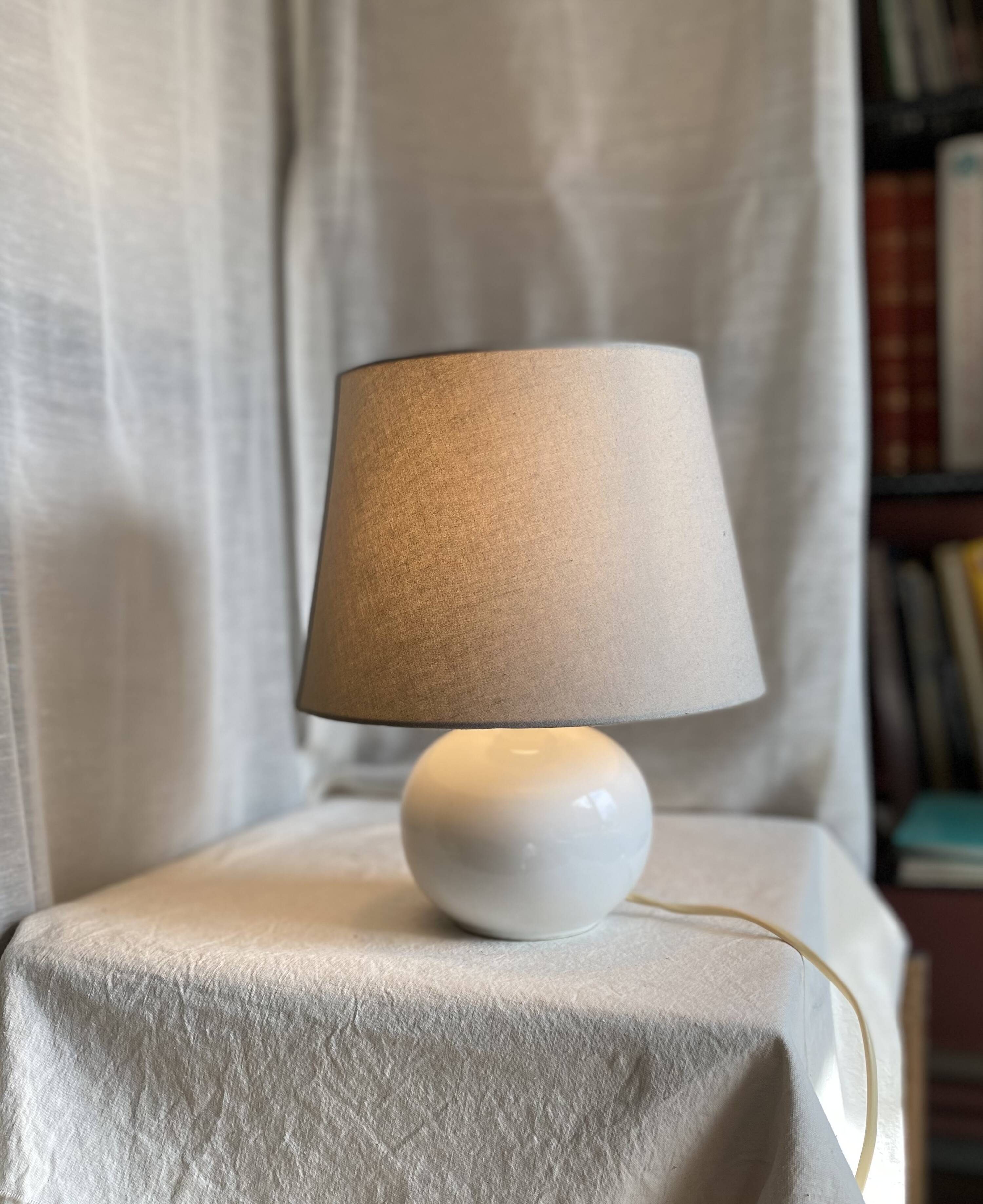 Vintage white earthenware ball lamp