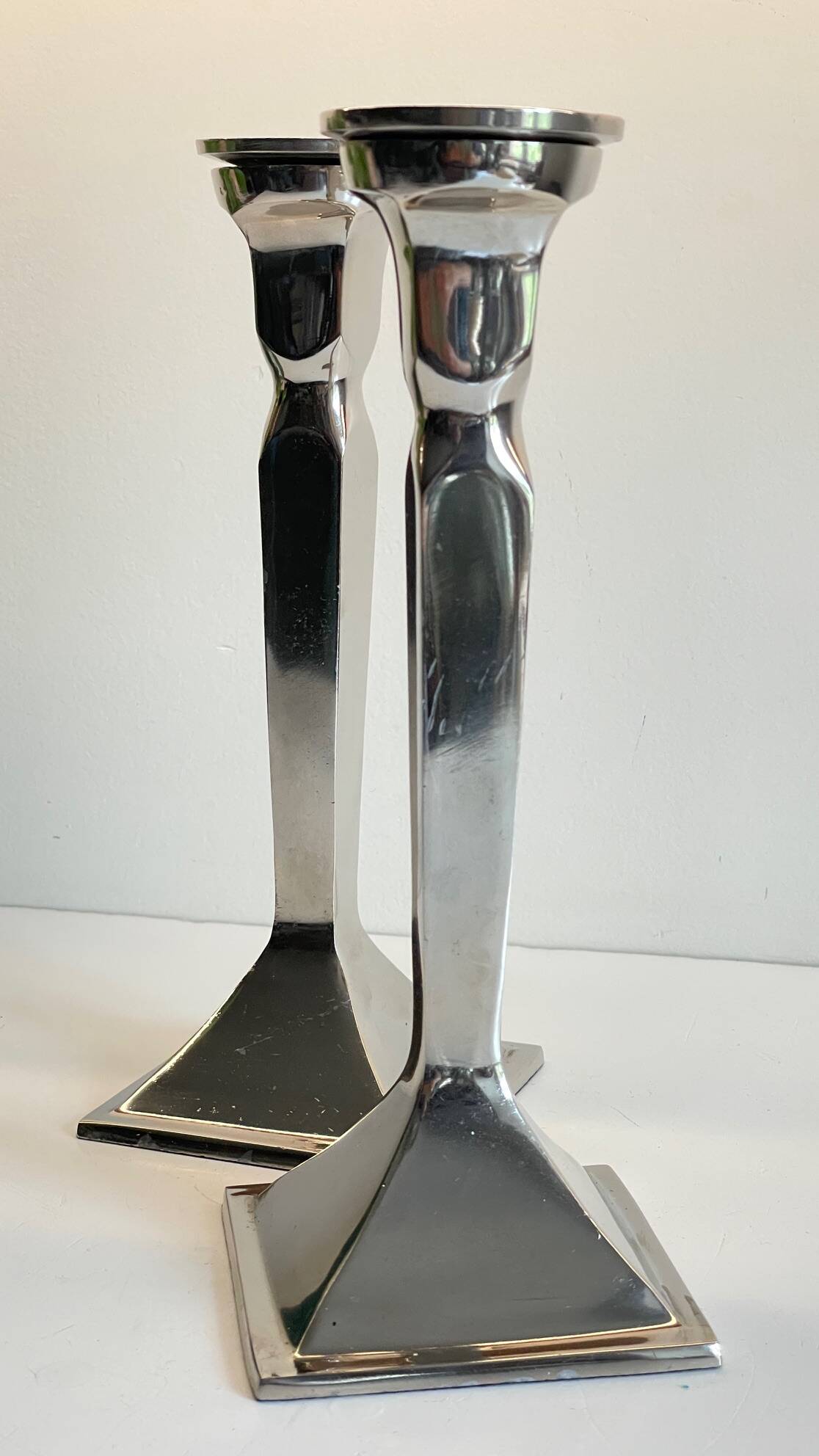 Pair of vintage cast aluminum candlesticks