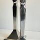 Pair of vintage cast aluminum candlesticks