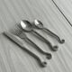 Service for 8 in shiny metal.