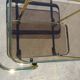 Golden metal and smoked glass dessert table