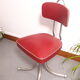 Chaise pivotante skaï bordeau 1960