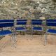 Lot de quatre chaises bleues aux courbes design