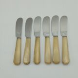 Twelve vintage butter knives