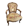 Armchair cabriolet eighteenth period Louis XV tapestry to the point floral decoration