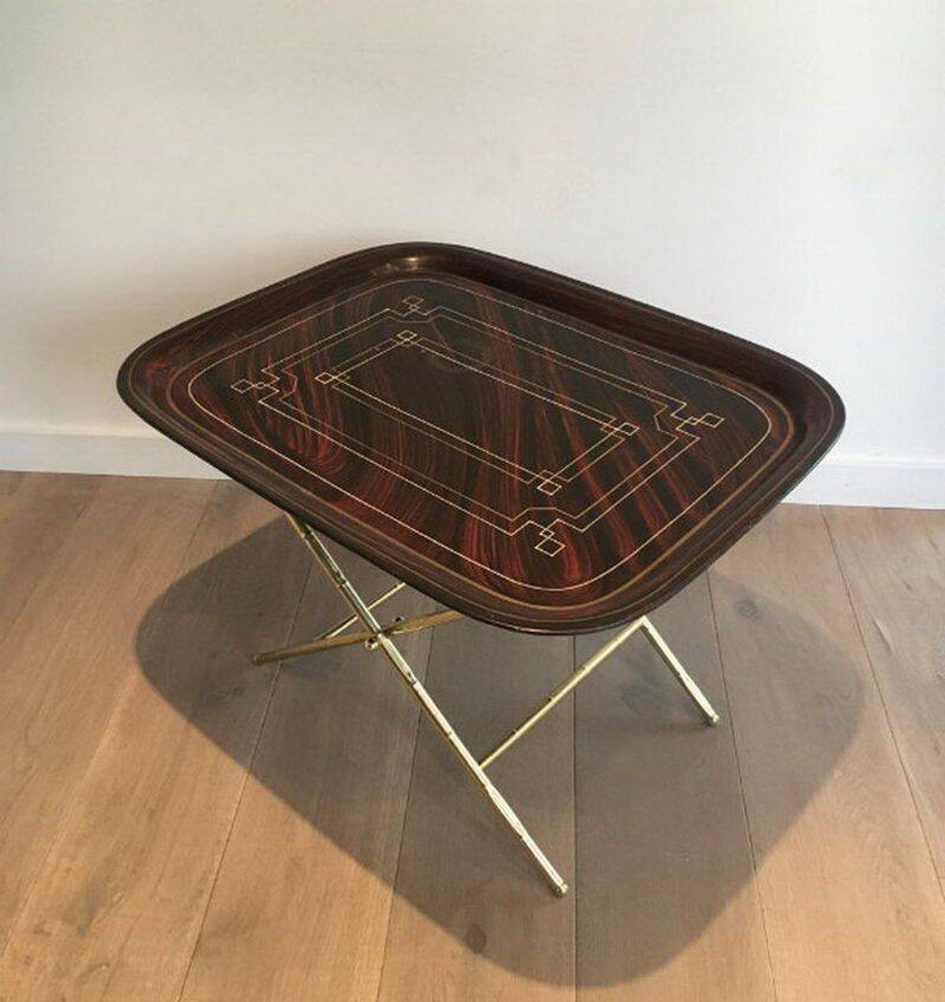 Beautiful table with a brass top and painted sheet metal