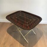 Beautiful table with a brass top and painted sheet metal