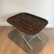 Beautiful table with a brass top and painted sheet metal