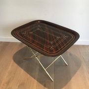 Beautiful table with a brass top and painted sheet metal