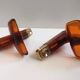 Duo of vintage grosfillex coat hooks model versailles amber plexi
