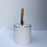 Vintage teapot with wicker handle