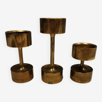 Three beautiful candle holders in solid brass, for block candles. Denmark 1960s