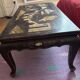 Chinese black lacquer coffee table with figurative decoration – Coromandel style – 20th century.