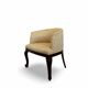 An antique Italian bar chair and a matching tufted vanity stool.