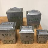 5 metal spice jars