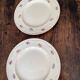 Two identical vintage Clarice Cliff plates from the Newport Pottery.