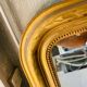 Large antique mirror with gold leaf in the Louis XV style.