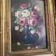 Golden framed flower bouquet painting